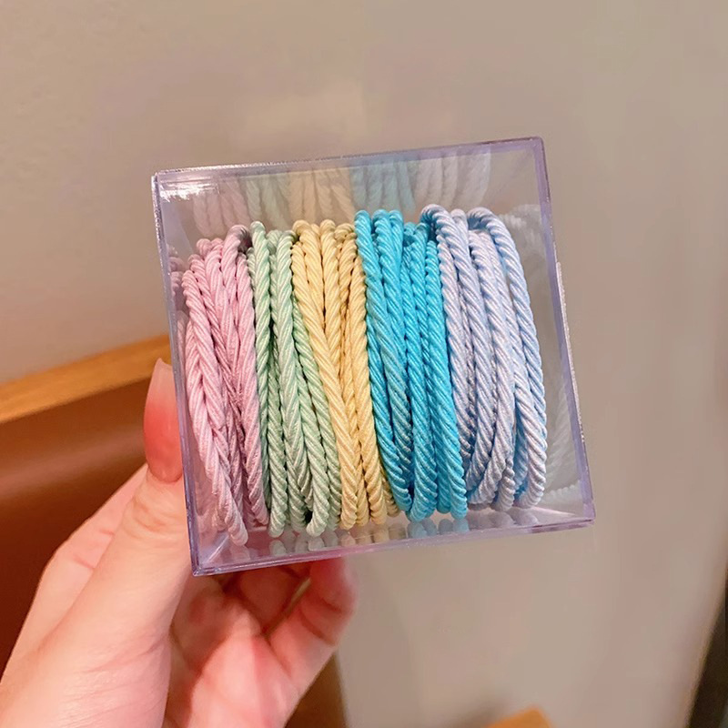 Alta elasticidad y durabilidad banda de goma simple cuerda de cabello de mujer corda de cabello de verano temperamento de cola de caballo color no daña anillo de cabello