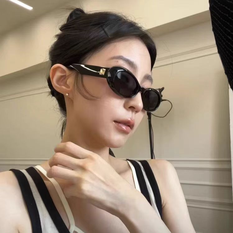 レトロな楕円形gmサングラスの女性ブーム欧米風の丸い顔の猫の目の街は形のサングラスのネットの赤い顔をたたきます。|undefined