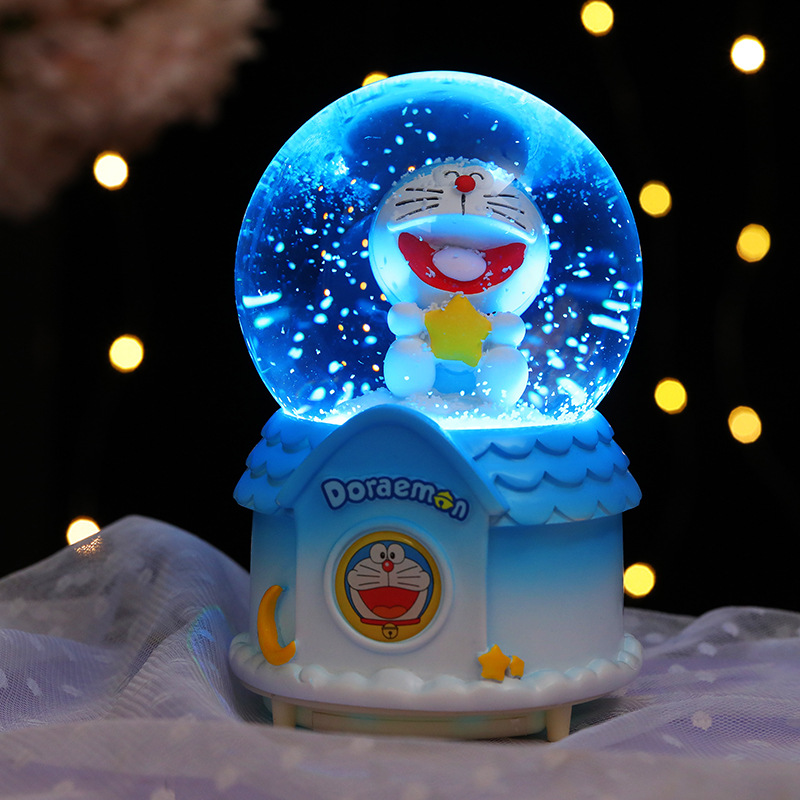 Nueva bola de cristal Doraemon Jingdang gato caja de música automática nieve azul claro grasa regalo de vacaciones