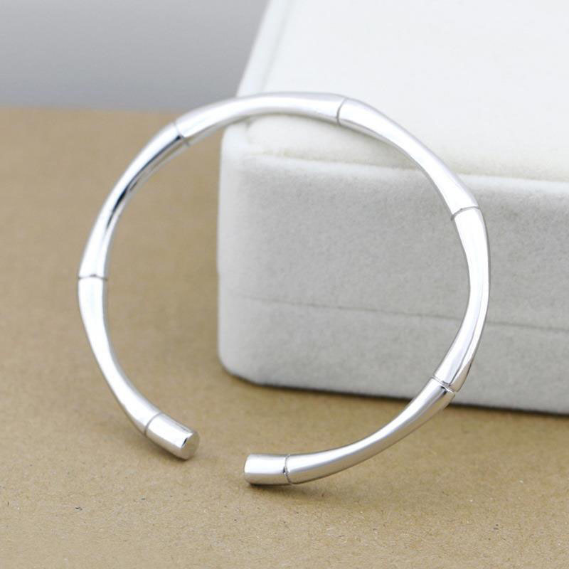 2023 Cruz-frontera de los hombres tejidos giro pulsera personalizada colección nueva europea y americana retro pulsera abierta al por mayor