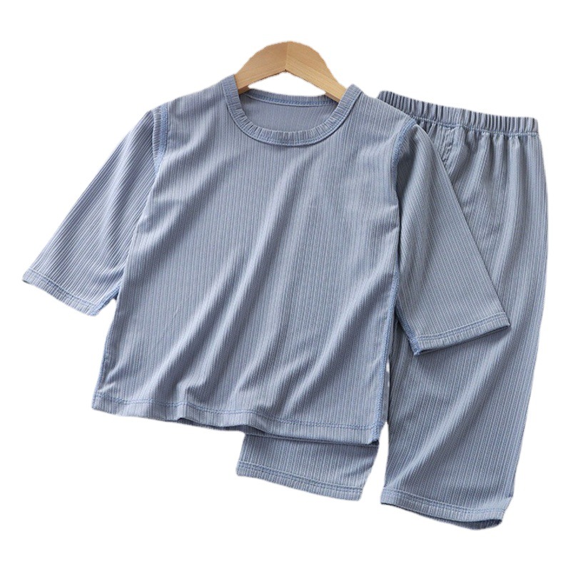 Nuevos niños del verano desgaste en casa traje de color sólido y niñas sin hueso delgada recortada pijamas pantalones pijama casual Set