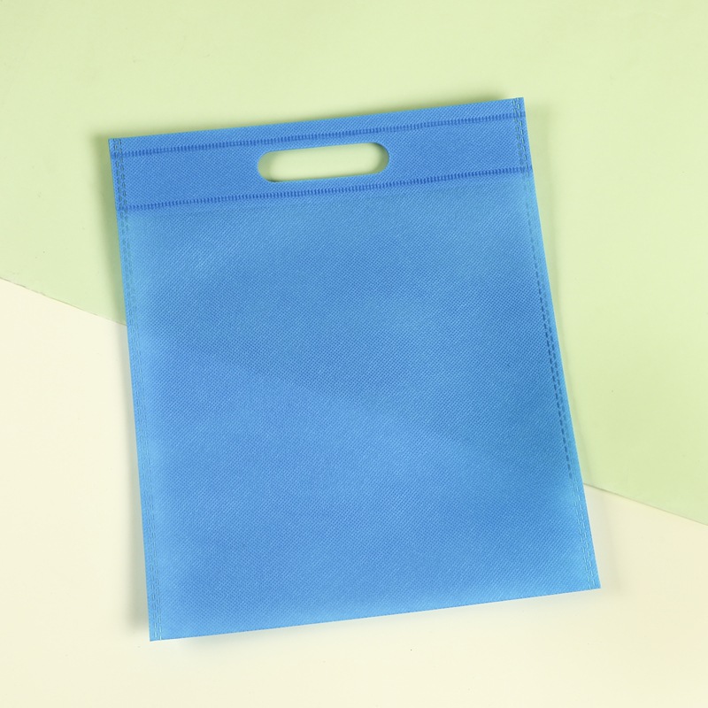 Bolsas de tela no tejida al por mayor en stock para ropa, bolsas de regalo promocionales a prueba de polvo con logotipo personalizado.