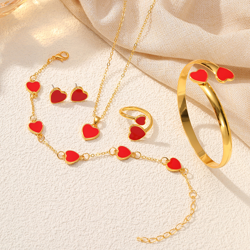 Europa y los Estados Unidos venta cruzada de joyas de amor conjunto de pulseras de corazón de桃ar pulseras pendientes collares anillos joyas femeninas