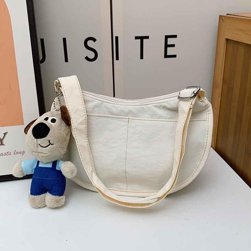 Bolsa de hombro coreana para niños y niñas de color sólido de gran capacidad bolsas de饺os para niños 2025 nuevas bolsas para niños con colgantes