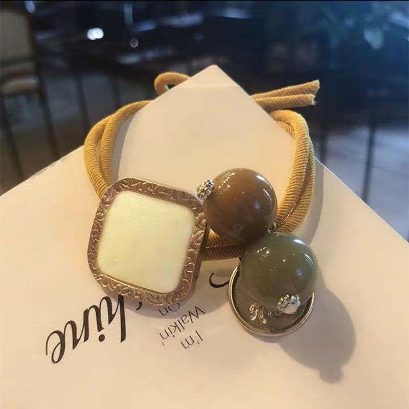 Elástico joyas de cabello de moda con frijoles frescos M anillo de cereza cuerda de cabello al por mayor de la banda de goma cabeza de 100 bolas de cabello rojo una variedad de alta elástica