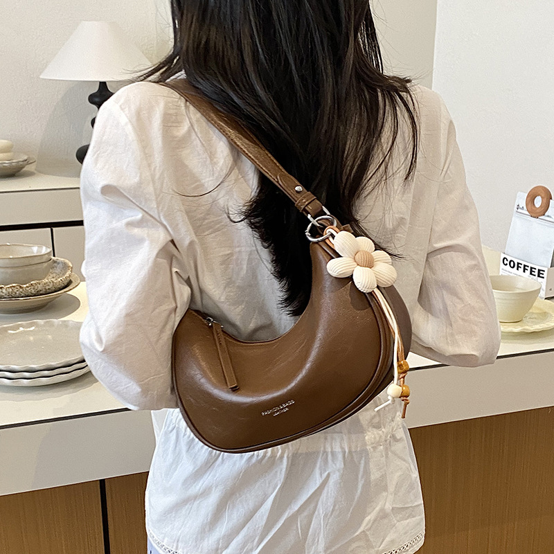 Bolso de mano popular de este año bolso de mujer 2026 nueva moda simple bolso de hombro de brazo universal bolso de饺os para mujeres