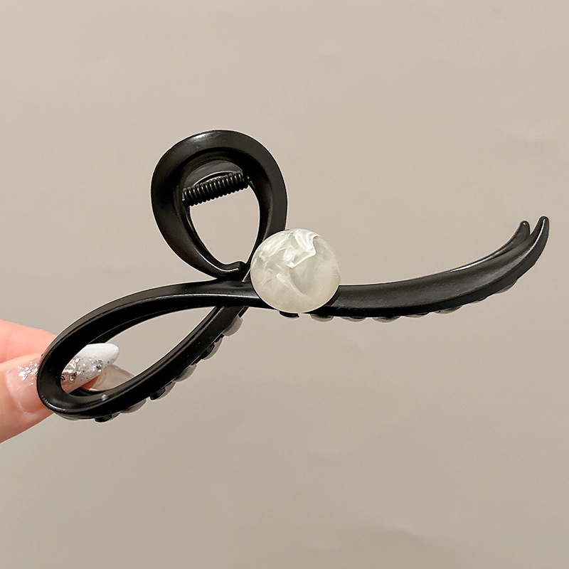 Clip de agarre acrílico simple retro Japón y Corea del Sur clip de tiburón para el cabello 2025 nuevo accesorio para el cabello en la parte posterior de la cabeza de las mujeres de alta gama