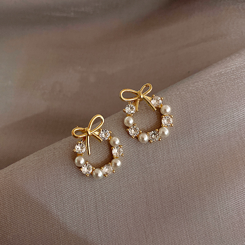 Elegant small cute earrings with bow