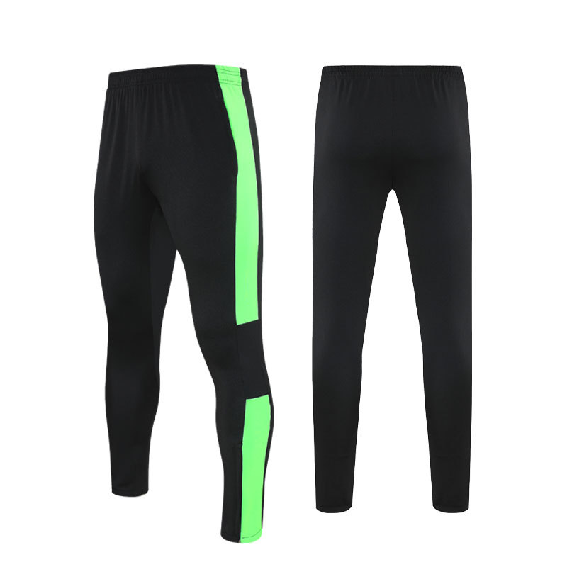Negro / verde fluorescente - Pantalones