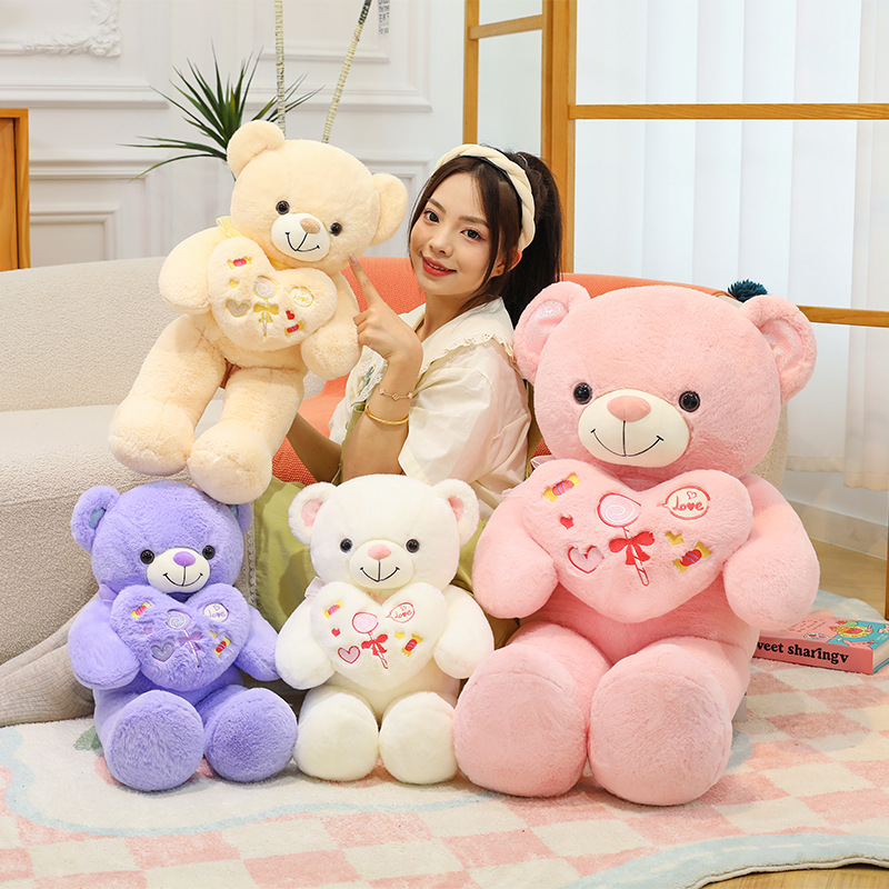 Linda muñeca de oso de peluche de peluche nueva muñeca de oso de peluche con flores al por mayor muñeca de oso de peluche grande