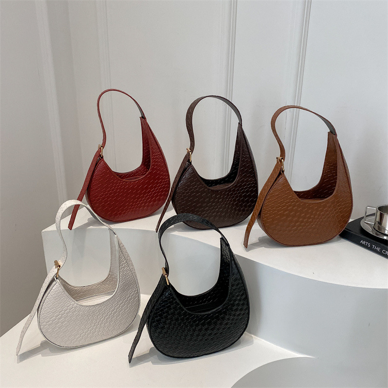 Bolsa de media luna francesa de tejido para mujeres 2025 nueva tendencia correa de hombro ancha textura de moda bolso de hombro bolso debajo de la axila