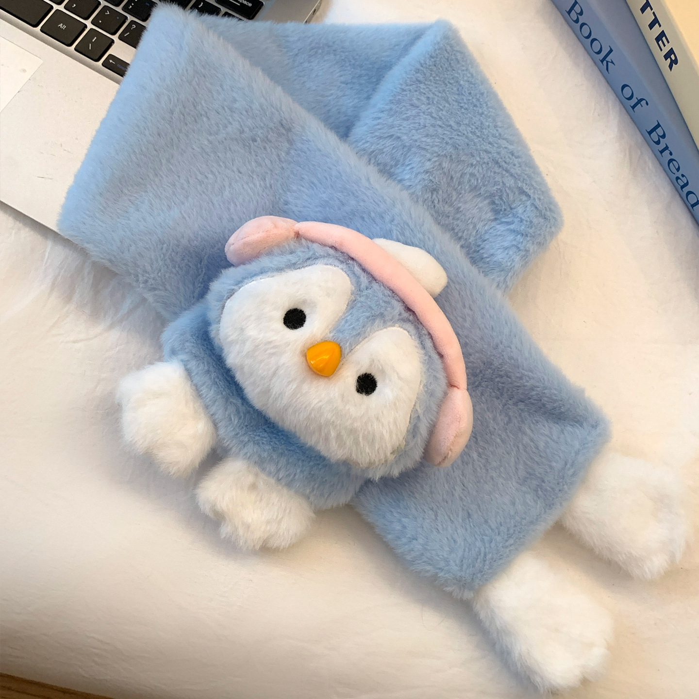 Auriculares azules bufanda de pingüino