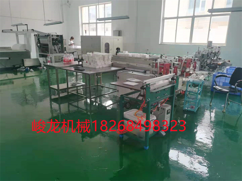 全自动高速棉柔巾折叠机 干巾手拉手互扣无纺布折叠机机械设备