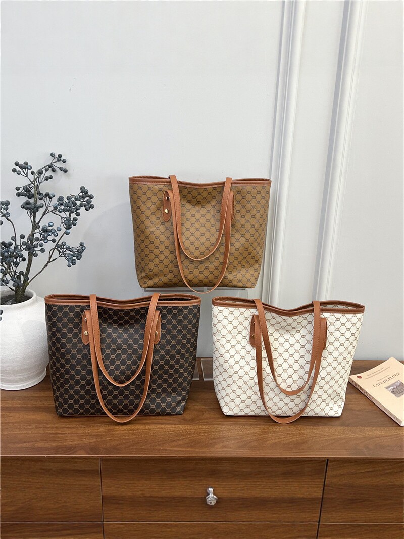 Bolsa de mano impresa retro de gran capacidad para mujeres 2026 nueva bolsa de hombro de viaje caliente de moda bolsa de mano versátil