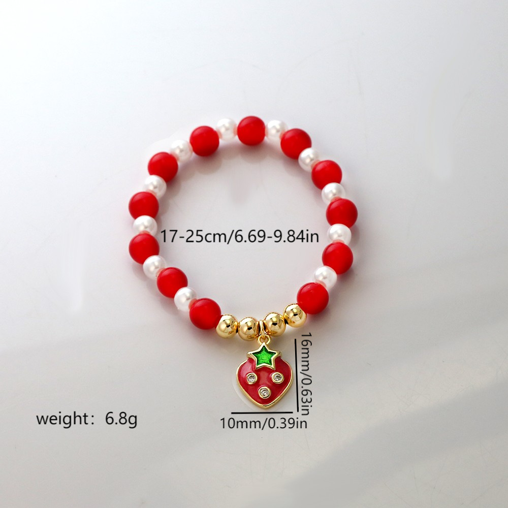 Pulsera con labios, perla y fresa esmaltados