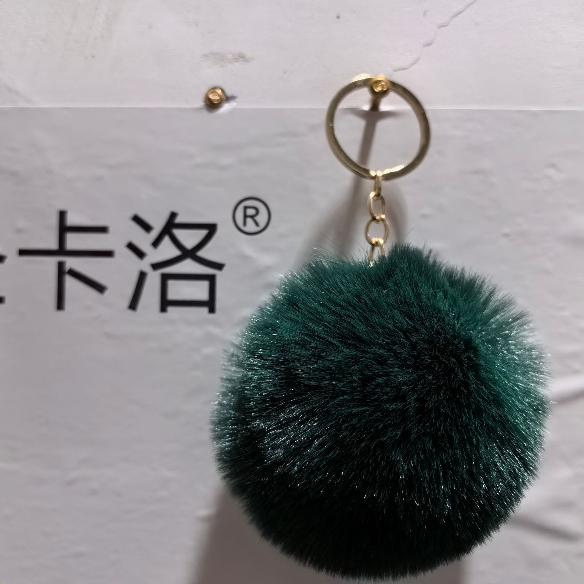 Elemento verde colgante cuerda llavero de peluche de piel artificial bolsa de lana corta colgante damas colgando bolsa accesorios al por mayor