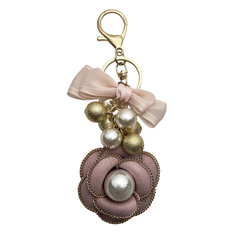 Cadena de La Perla La Camelia llavero bolsa colgante moda doble arco creativo mercancías del comercio exterior image 1