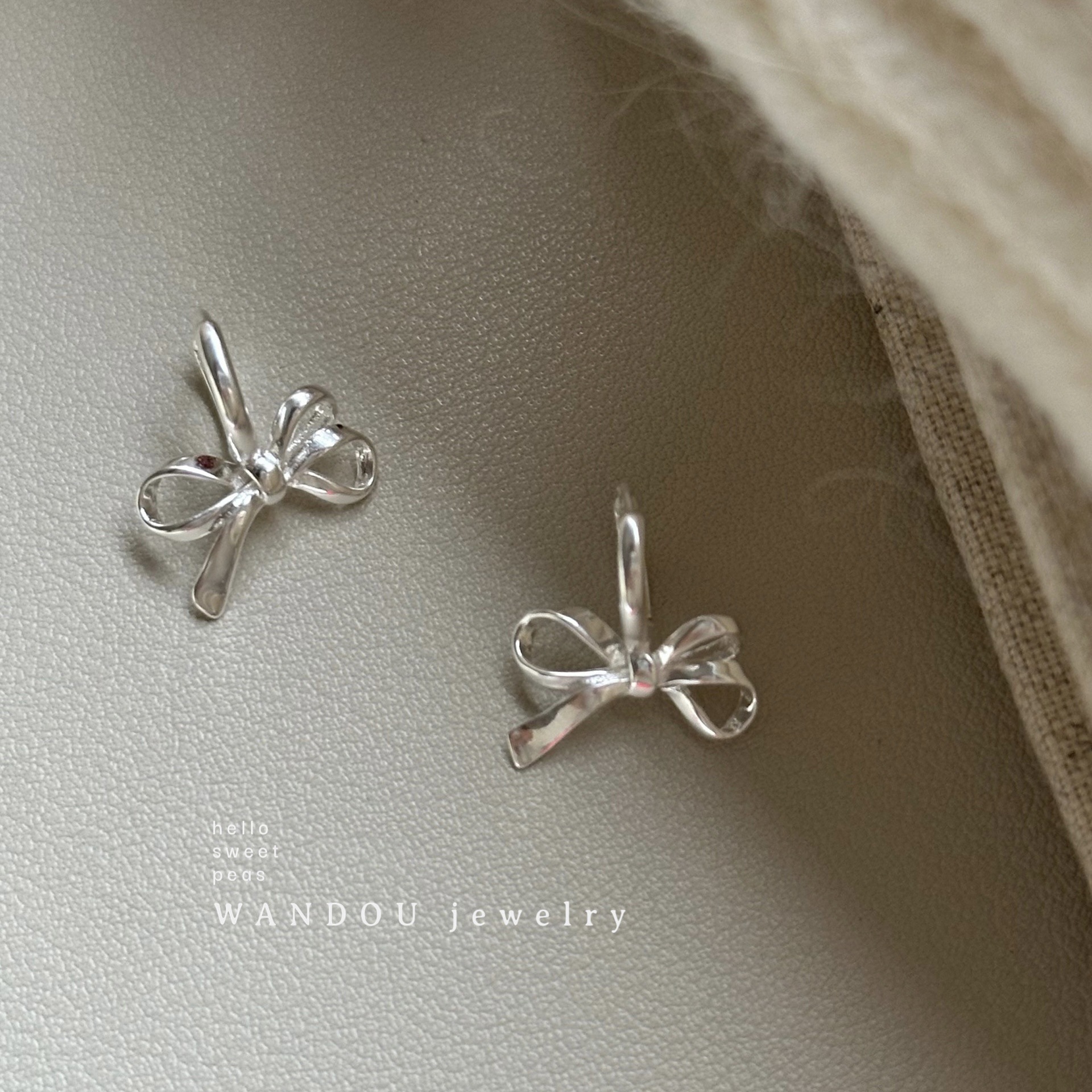 Nuovo fiocco per donna di alta qualità, orecchini con un design di nicchia, piccole fibbie in stile profumo e accessori per le orecchie_voghion.com