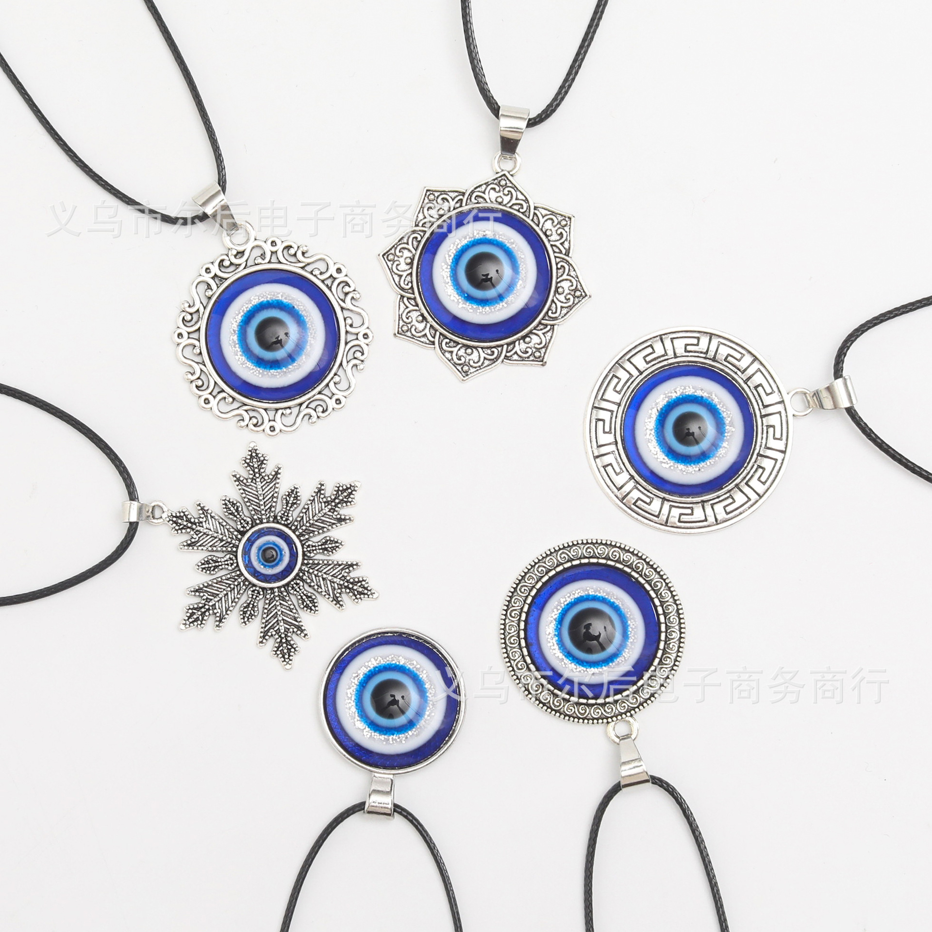 Joyas transfronterizas europeas y americanas retro turcas aleación redonda azul colgante ojo del diablo colgante ojos azules al por mayor