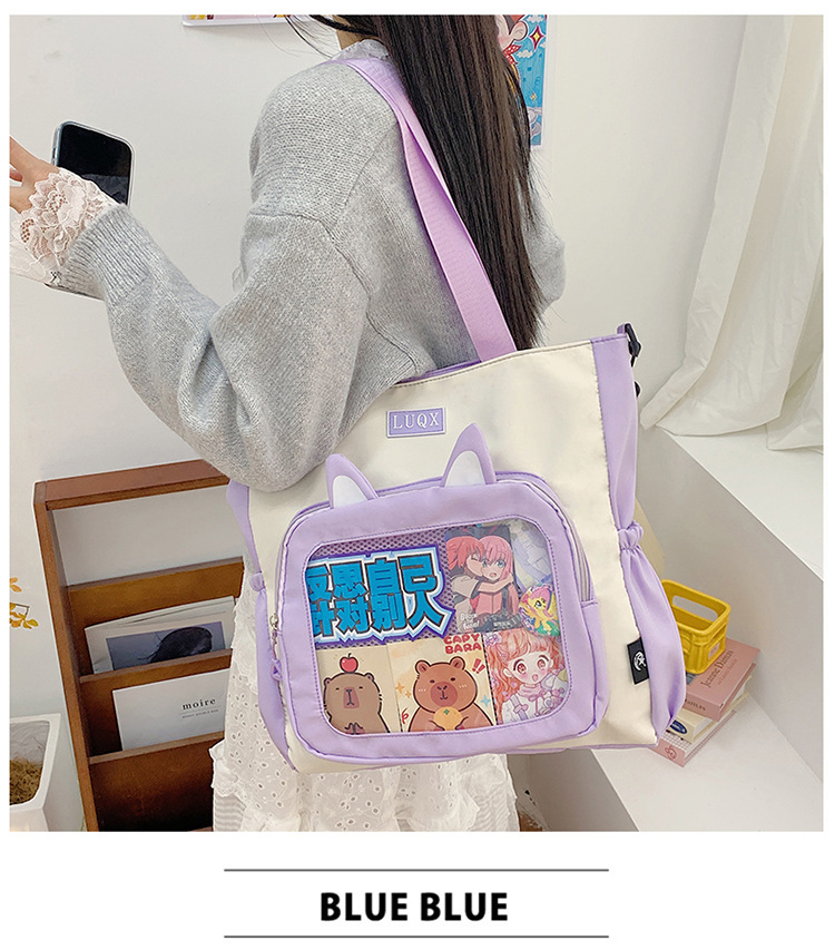 The new cute cartoon printed student bag with a large capacity and transparent student storage single-shoulder bag is selling well for women undefined