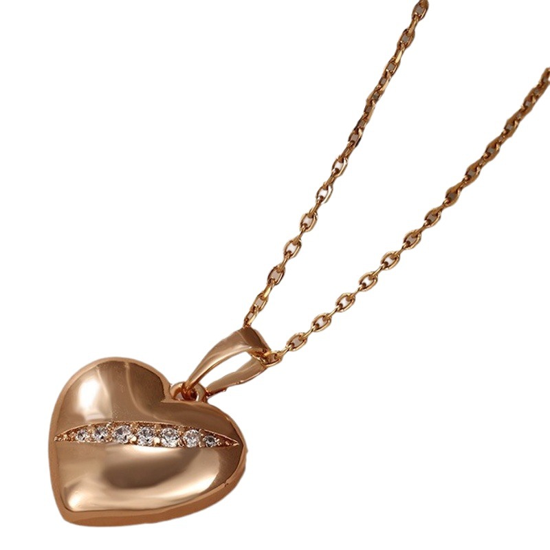 Joyería Xupe estilo coreano nicho diseño alto sentido collar joyería mujer neto rojo Luz de lujo temperamento amor colgante venta al por mayor