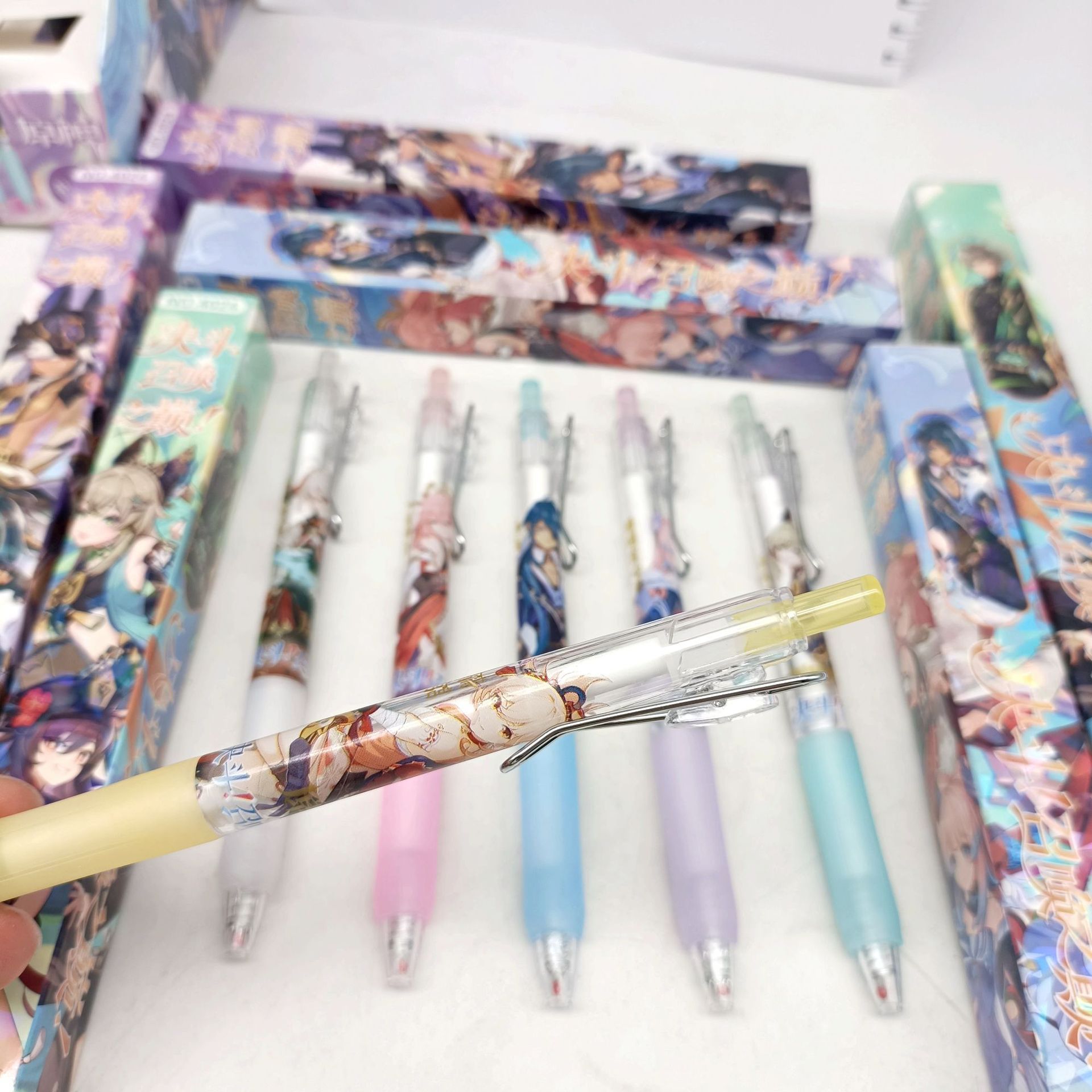 Nuevo dios original sorpresa caja ciega pluma dibujos animados juegos de dibujos animados personajes gráficos escritos suaves pulsar pluma neutra pluma al por mayor