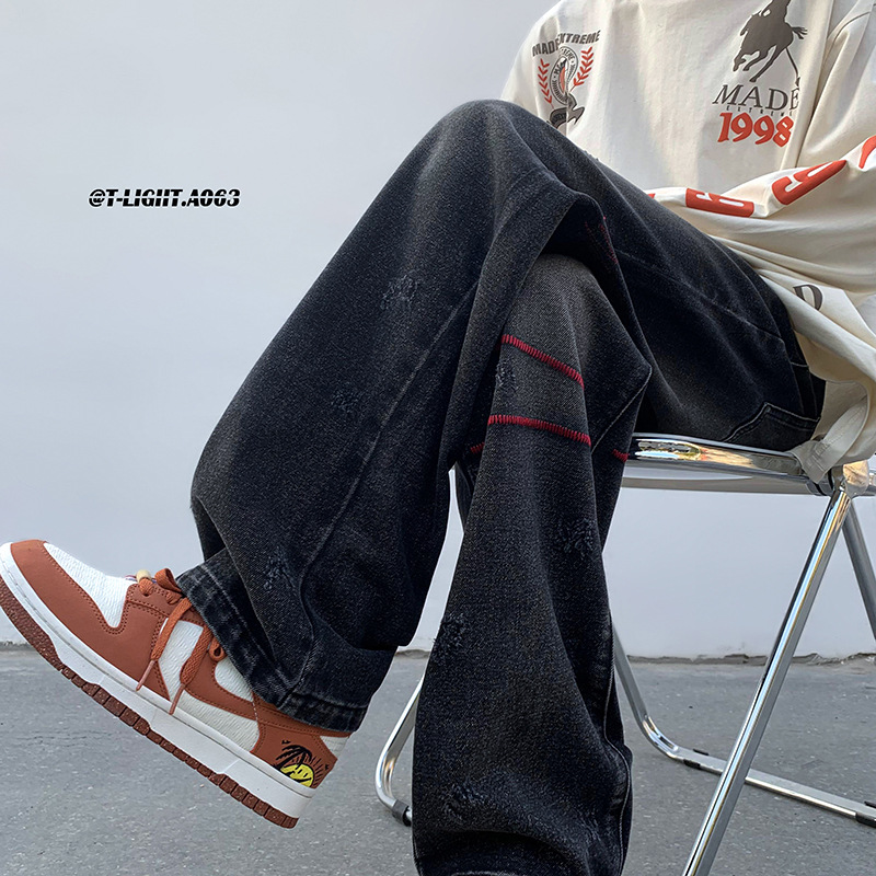Nuevo producto Trend American White Retro Bordado Scratch Old Jeans Pantalones sueltos Hombres y mujeres Trendy Long