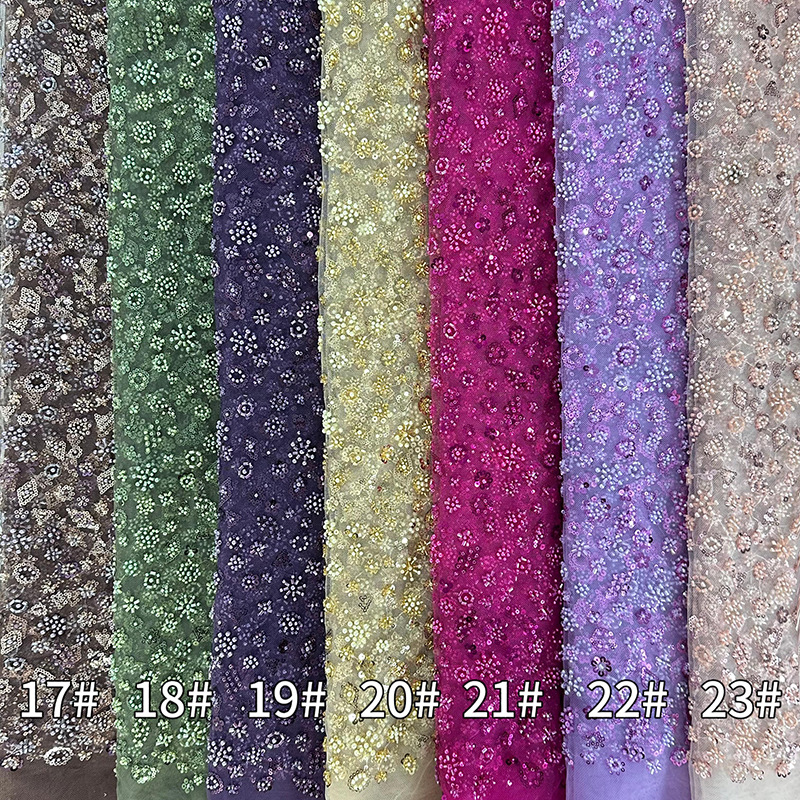 Tejido de bordado de tubo de perlas de lenteja tejido de bordado de malla láser tridimensional tejido de moda de vestido europeo y americano Gaoding