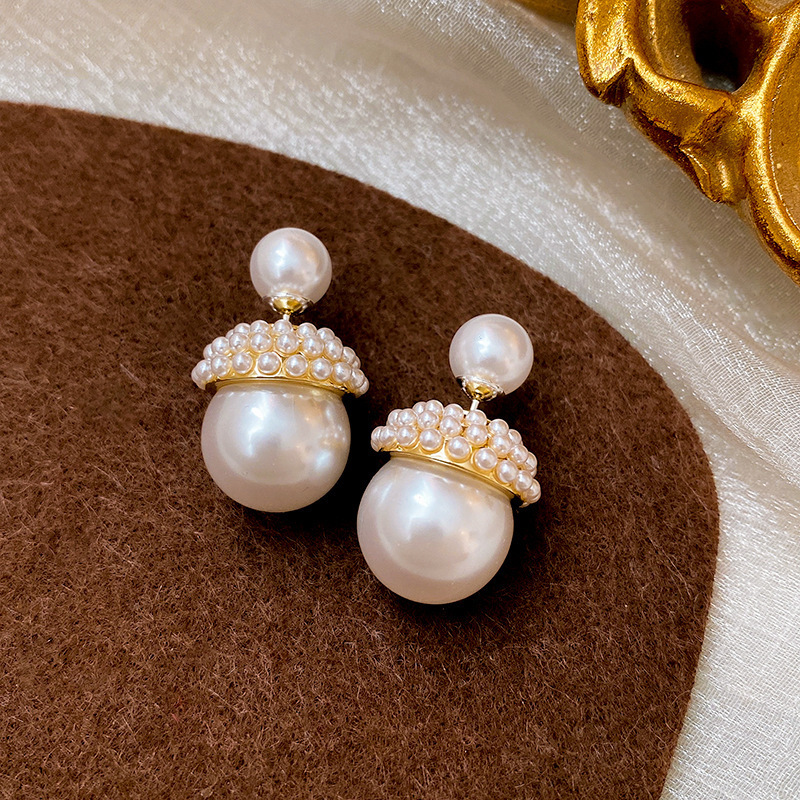 S925 aguja de plata de Corea del Sur de doble cara pendientes de perlas de dos piezas pendientes de diseño de temperamento retro simple de las mujeres