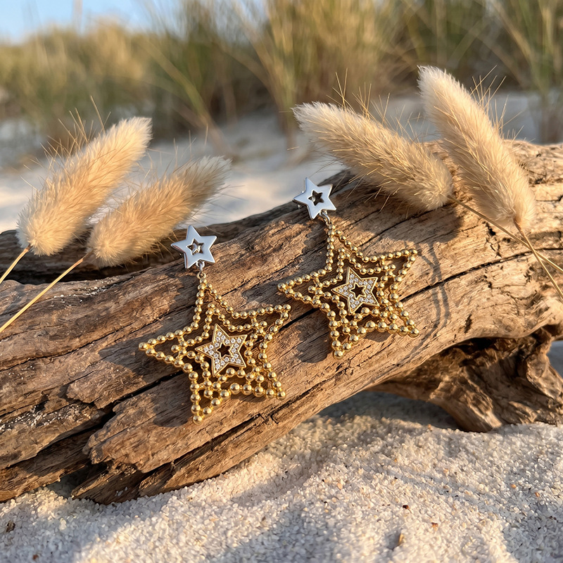 TENA Europa y los Estados Unidos acero inoxidable transfronterizo esfera dorada estrella de diseño de estilo pentagrama temperamento aretes de aretes versátiles