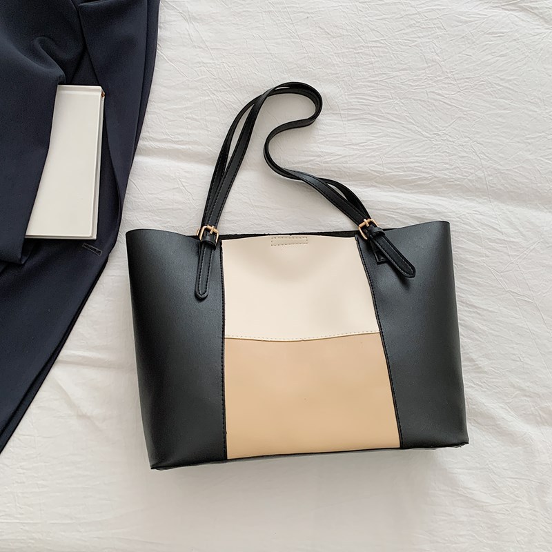Bolso de cercanías atmosférico para mujer, estilo occidental de gran capacidad 2025 verano nuevo estilo retro simple bolso portátil de un solo hombro para mujer