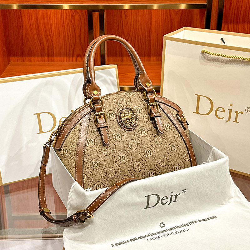Hong Kong genuine goods 2024 New European and American Genuine Leather Women's Bag Large Capacity Shoulder Portable Women's Design Trendy Shell Bag