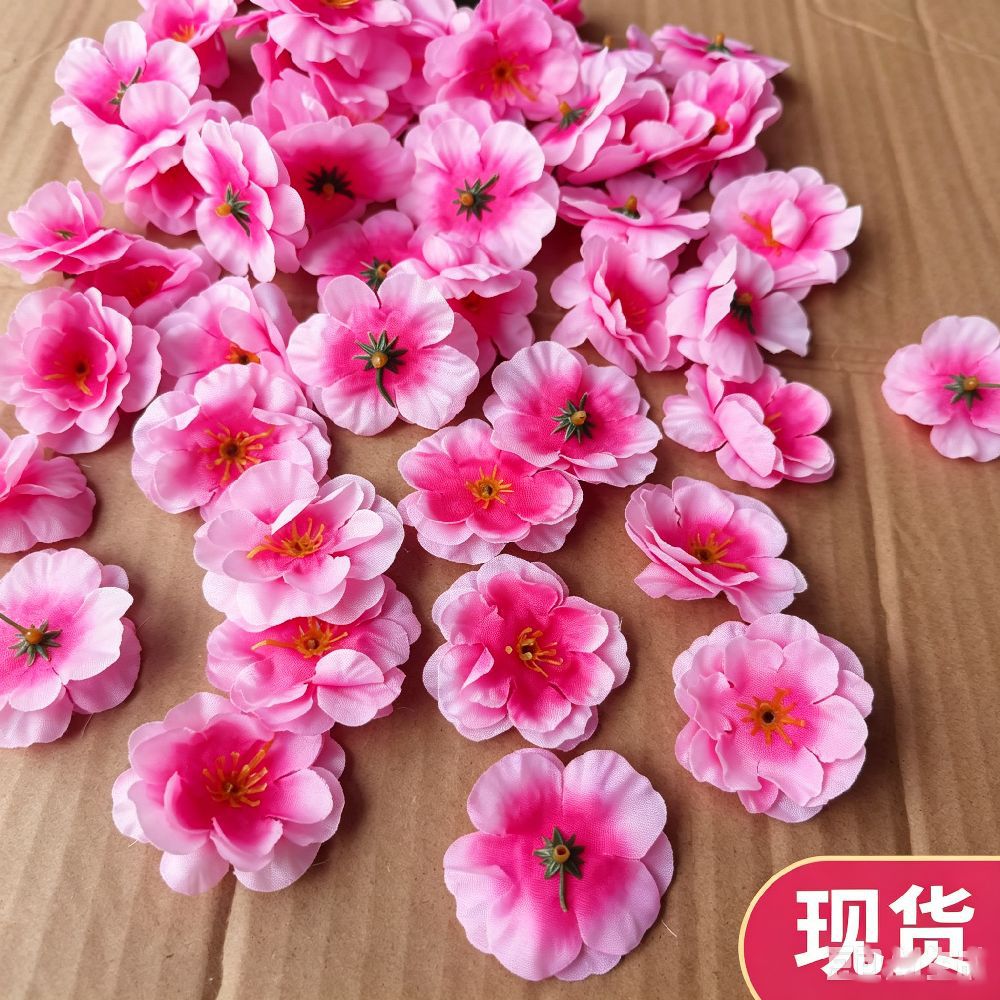 现货仿真桃花朵樱花小花朵婚礼装饰花假花拍摄道具梅花朵桃花瓣产品实拍图