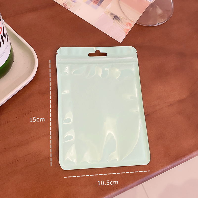 Macaron color bolsa de autosellado bolsa de plástico engrosada transparente color hueso bolsa de almacenamiento sellado bolsillo maquillaje cepillo bolsa de embalaje