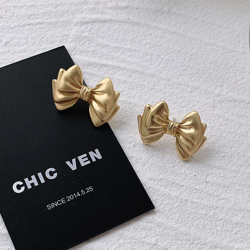 elegant retro sophisticated earrings with bow