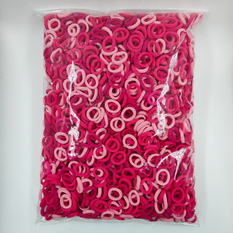 Fábrica directa sin costuras de alta elasticidad cuerda de cabeza para niños anillo de toallas OPP2000 anillo de cabello de cabello para bebés al por mayor