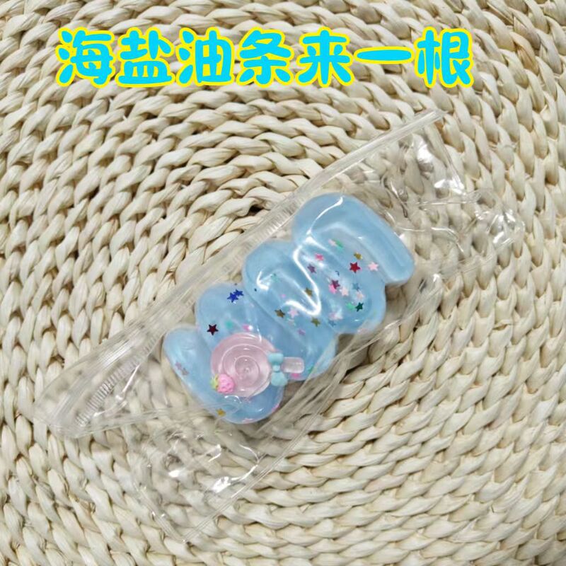 猫の爪のクリームの条の華夫はつまんで音楽をつぶします。|undefined