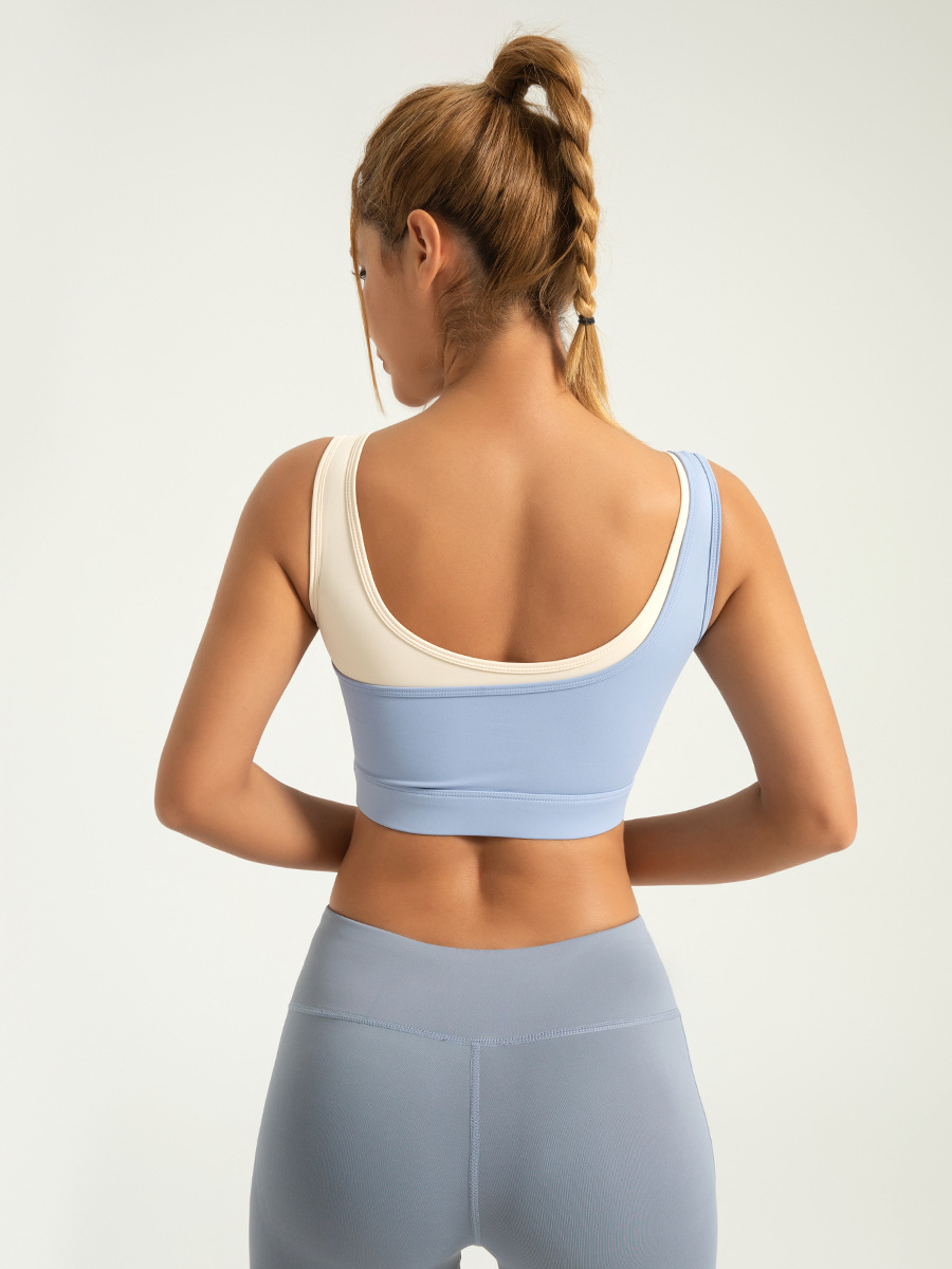 Sujetador deportivo de alta elasticidad con bloques de color para comercio transfronterizo, diseño integrado fijo, a prueba de golpes de alta intensidad, sujetador deportivo push-up en forma de U.