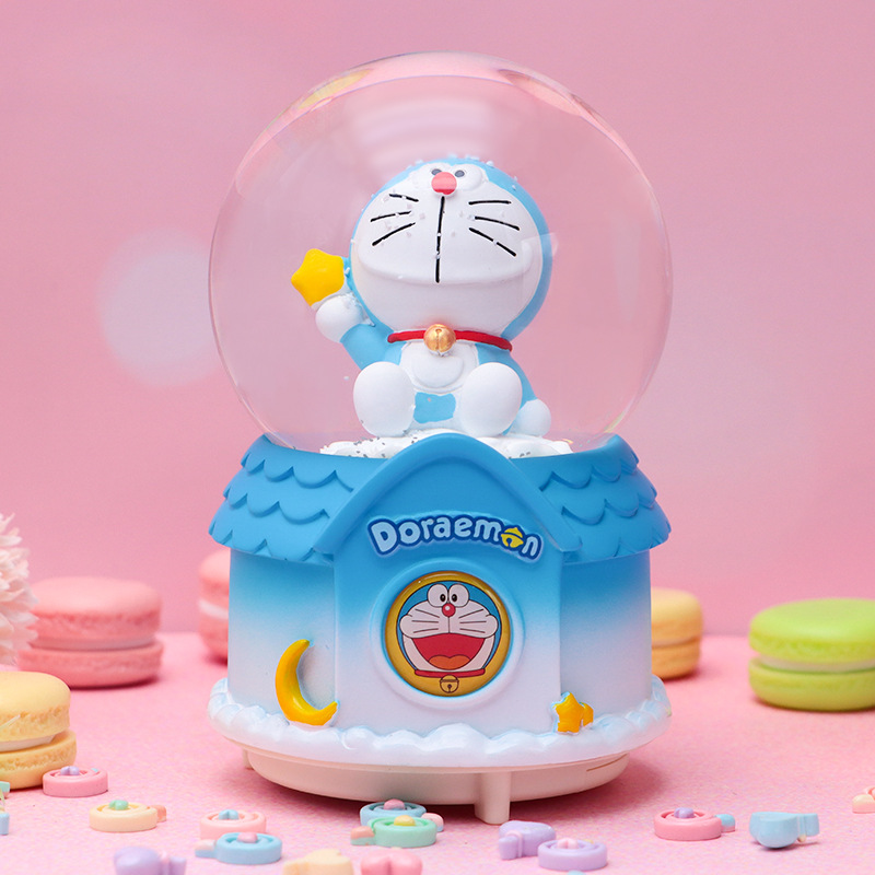 Linda campana tren azul gordo bola de cristal caja de música para niños y compañeros de clase regalo caja de música de nieve brillante