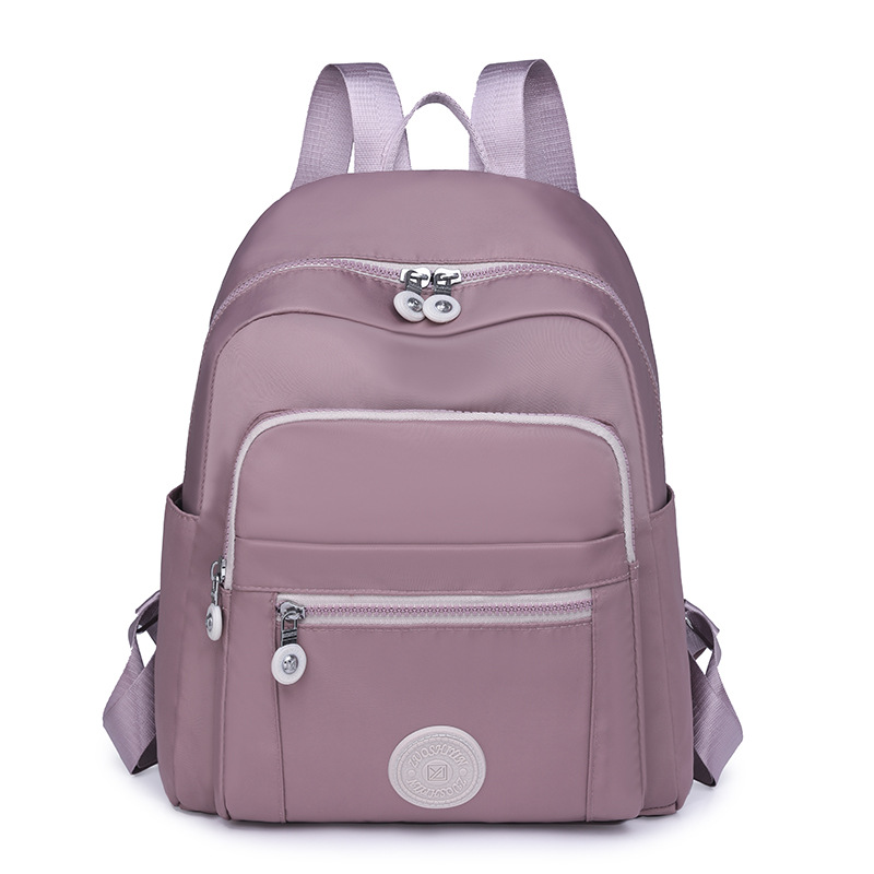 Los fabricantes venden al por mayor nuevas mochilas casuales para damas, mochilas de viaje de gran capacidad de moda, mochilas escolares para estudiantes universitarios coreanos