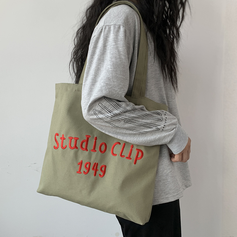 Estilo chino bordado bolsa de lona de los hombres femeninos de hombro nicho original simple letras artísticas de gran capacidad bolso de escuela del estudiante