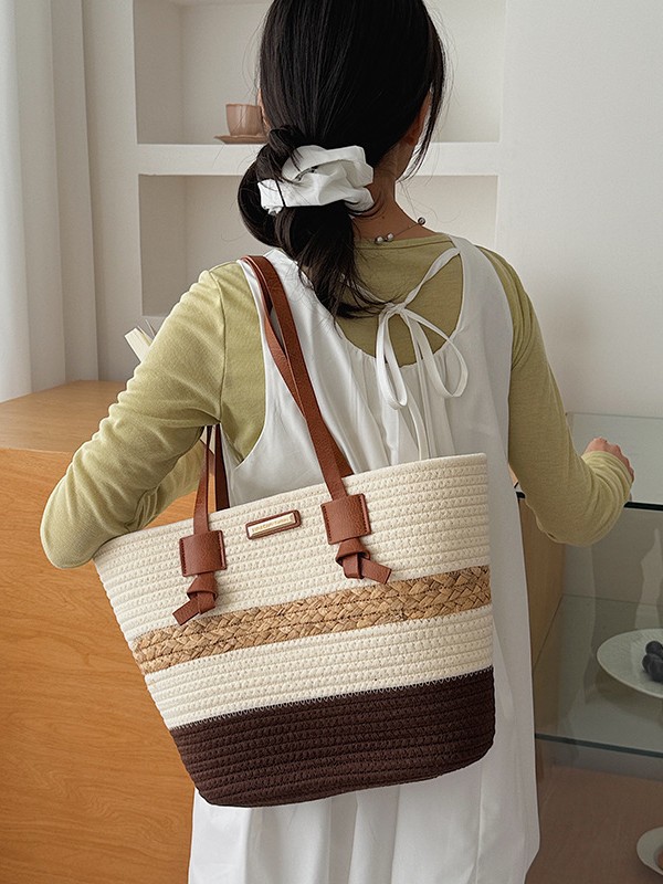Bolso de mano de gran capacidad para mujeres 2026 verano nuevo estilo de moda tejido bolso de hombro brazaleta de viaje bolsa de ocio