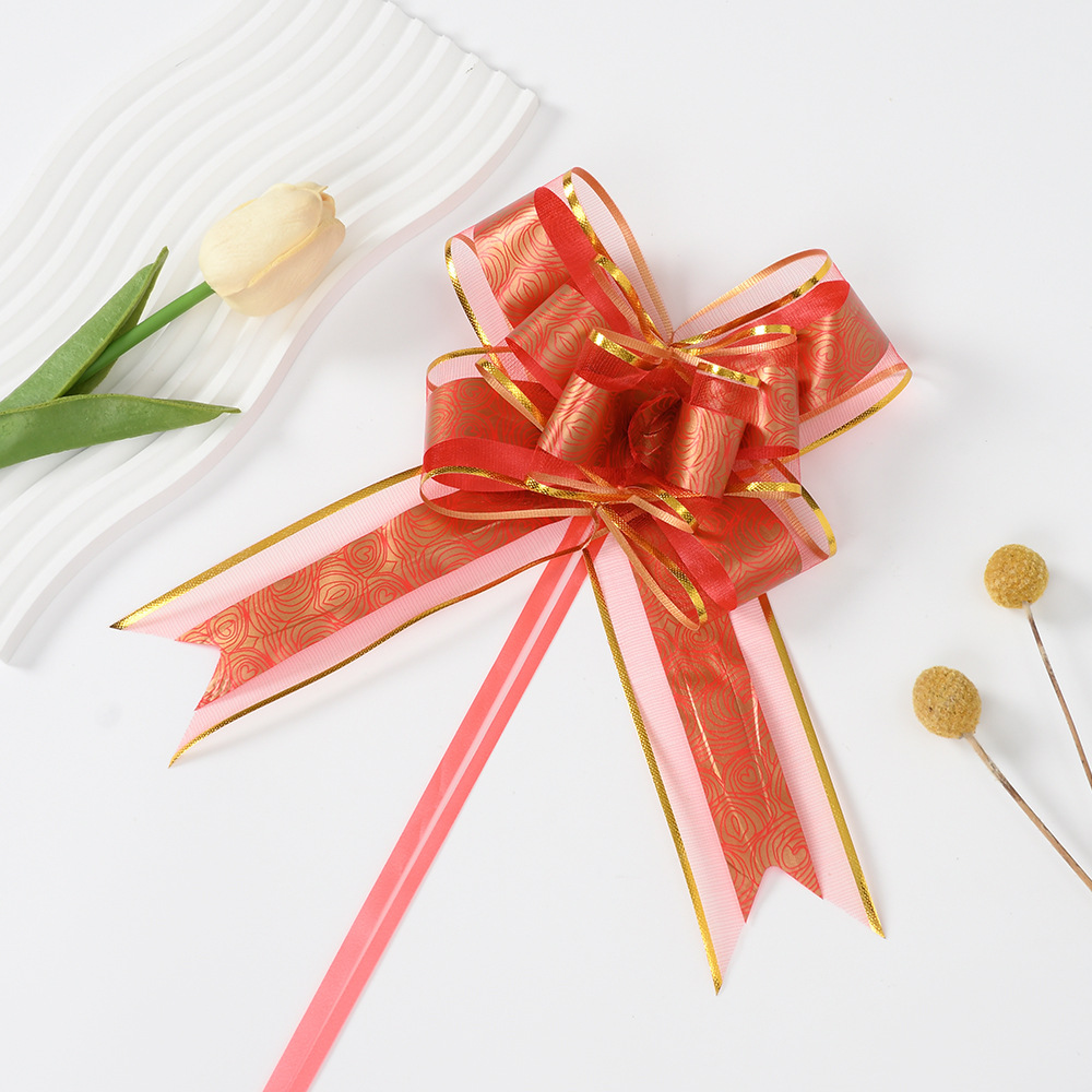Explosiones transfronterizas 50 grandes decoración rosa nieve arco mano flores canasta de frutas paquete de regalo de Navidad