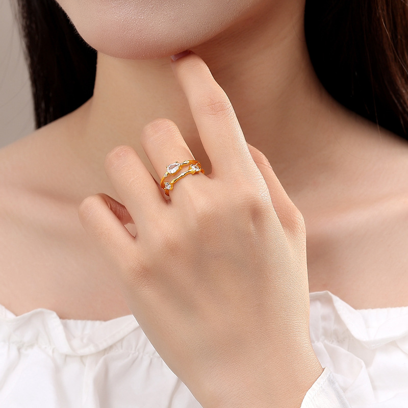 925 plata versión coreana del anillo femenino diseño de nicho gota de agua viento simple luz lujo doble línea de anillo fabricante más vendido