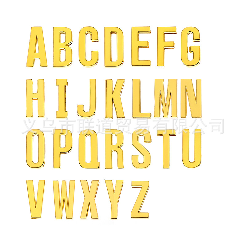 Golden glossy metal accessories with letters