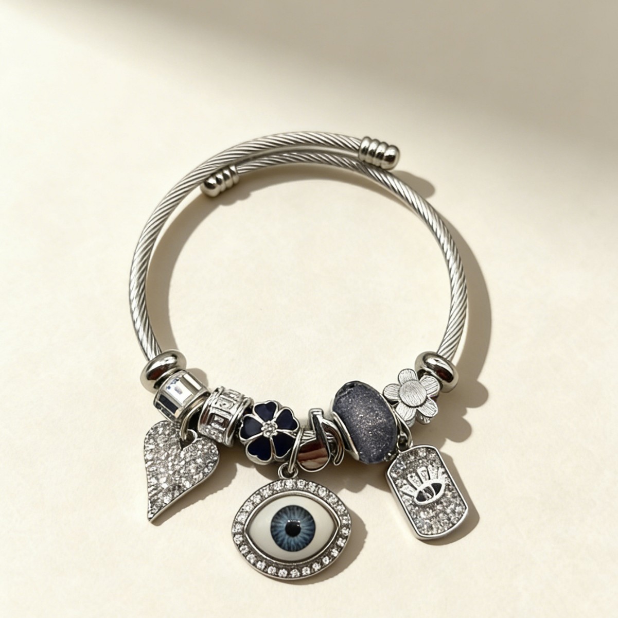 Panjia pulsera de acero inoxidable explotadora transfronteriza diamante plata aleación diablo ojo de amor nota joyas de flores image 1