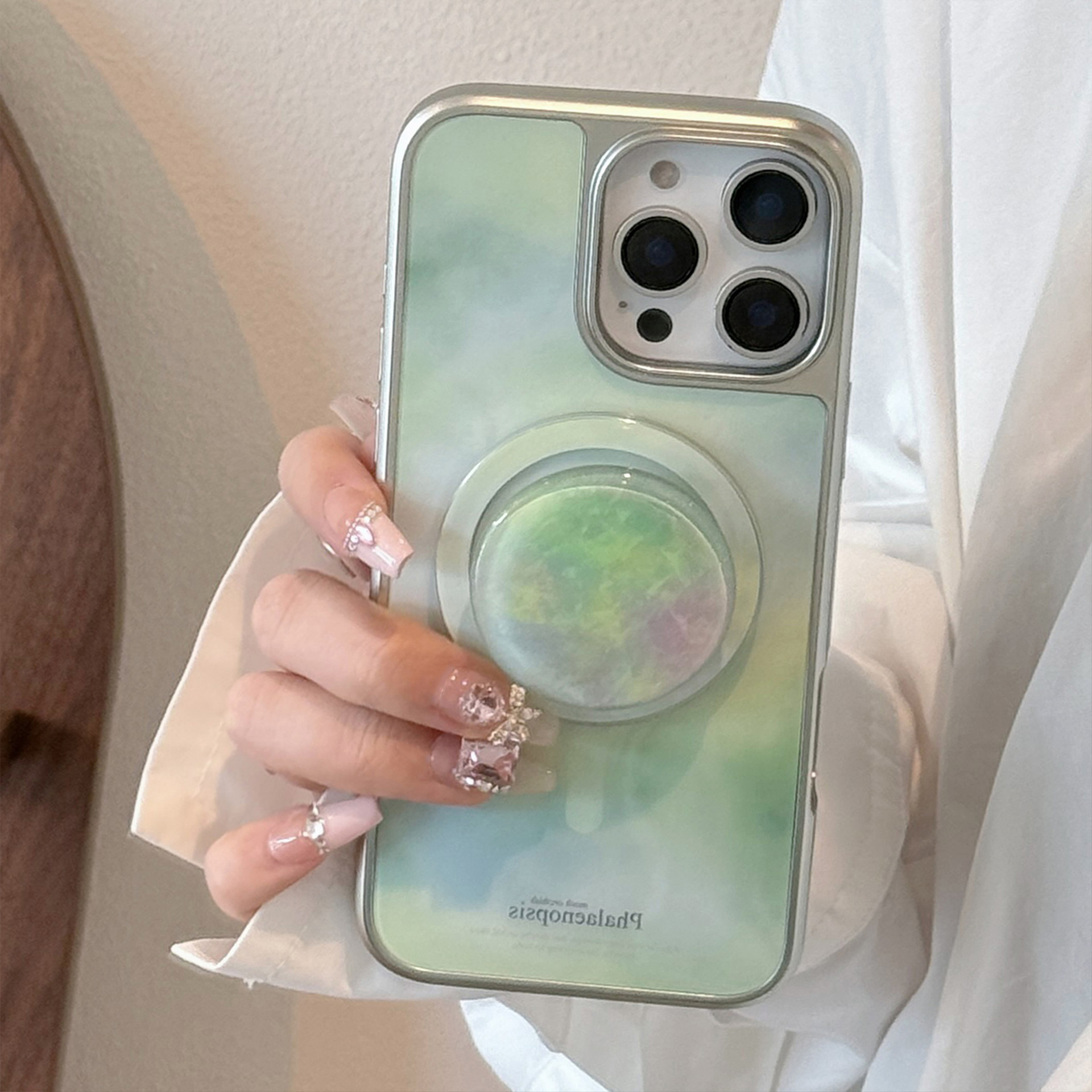 Piedra de patrón simple y avanzada adecuada para Apple 15ProMax funda para teléfono móvil 16Pro nicho 14/13 atracción magnética 16PM