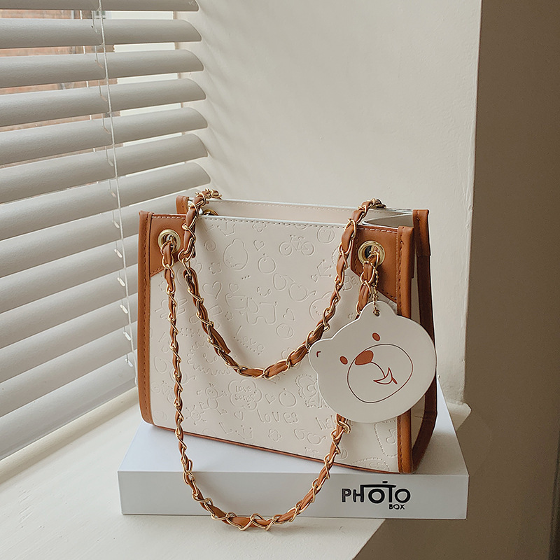 Bolso popular de este año para las mujeres 2023Dong nueva moda dulce bolsa de asas de gran capacidad de la cadena del hombro bolsa de mensajero