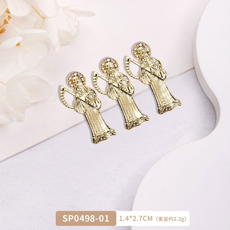 Arte de uñas transfronterizo Jesús accesorios de metal DIY vintage metal aleación uñas arte joyería europea y americana Luz de lujo accesorios con diamante