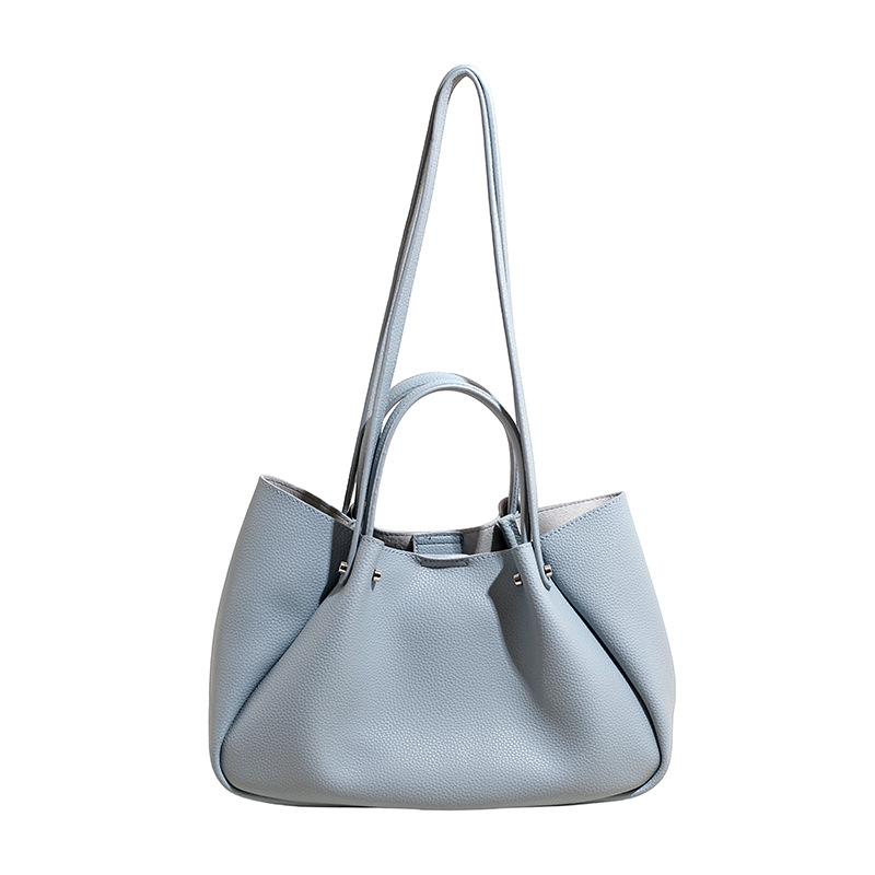 Bolso coreano nicho bolso de brazo bolso de mujer 2026 nueva gran capacidad de transporte universal bolso de hombro